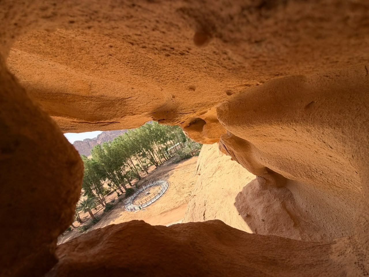 The oasis through a rock window