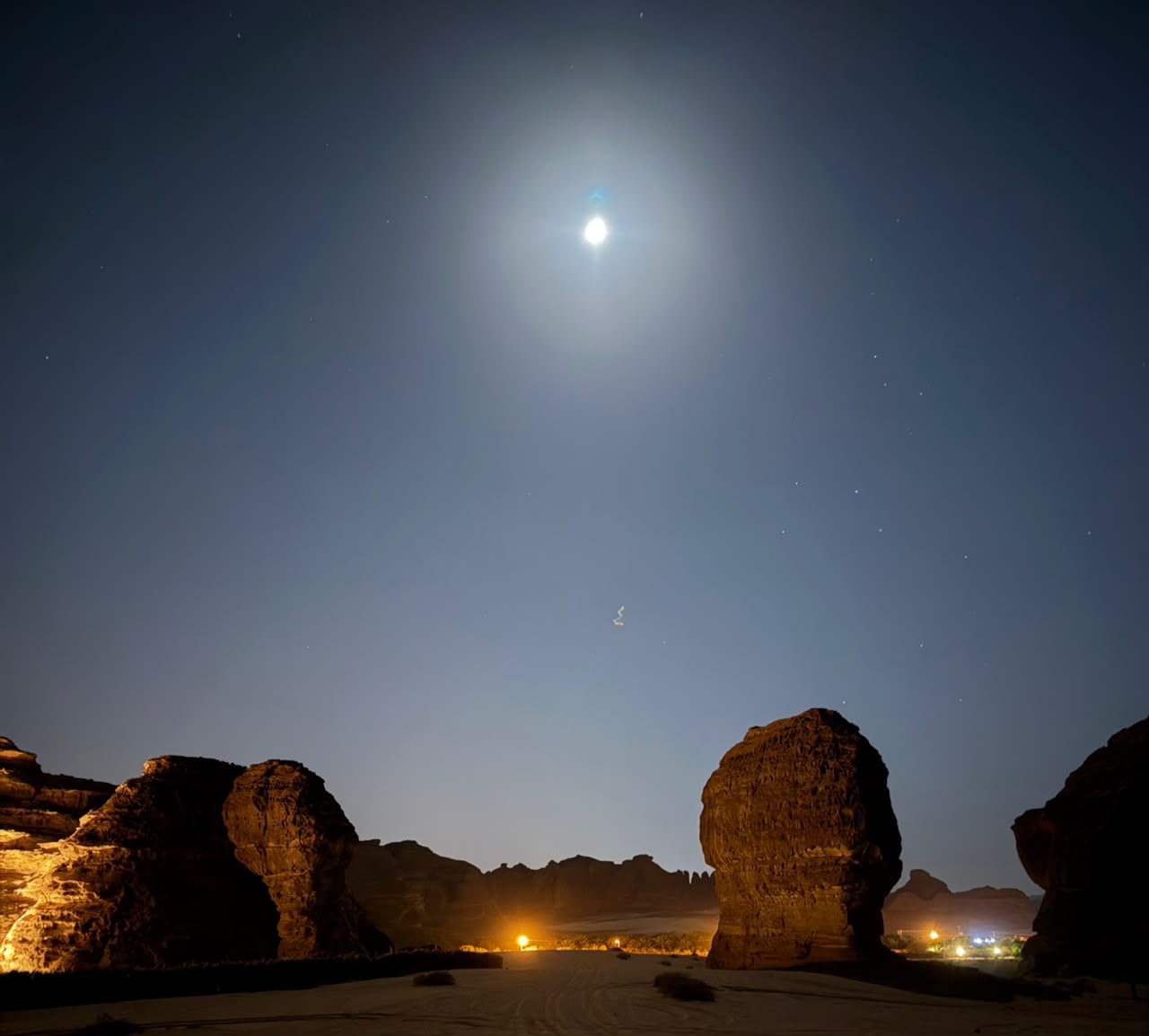 The moon over AlUla's rocks